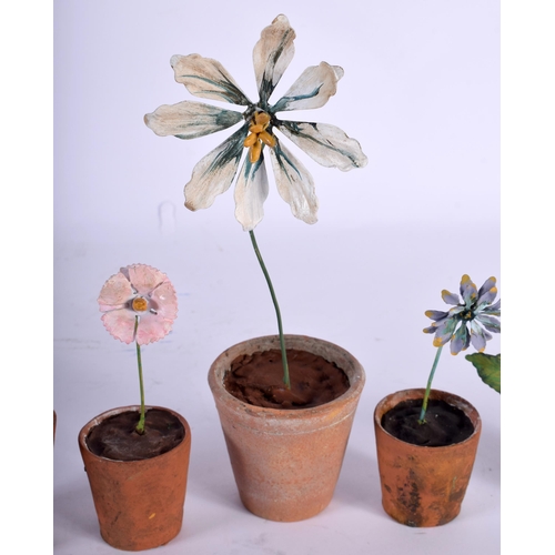 570 - A SET OF FIVE VINTAGE FRENCH TERRACOTTA AND ENAMEL FLOWER POTS. Largest 21 cm high. (5)