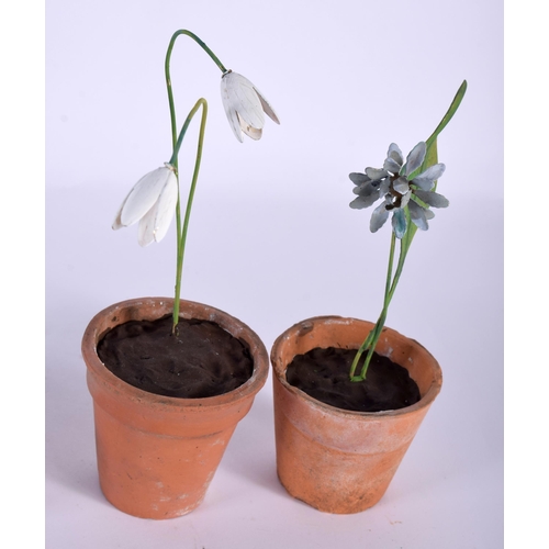 571 - A SET OF FIVE VINTAGE FRENCH TERRACOTTA AND ENAMEL FLOWER POTS. Largest 15 cm high. (5)