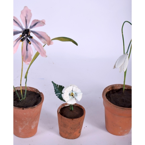 571 - A SET OF FIVE VINTAGE FRENCH TERRACOTTA AND ENAMEL FLOWER POTS. Largest 15 cm high. (5)