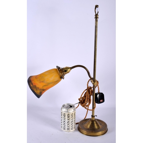 573 - AN ART DECO MULLER FRERES GLASS AND BRASS ADJUSTABLE LAMP. 50 cm high.