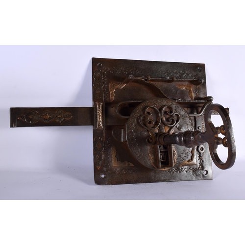 575 - A HUGE EARLY CONTINENTAL CAST IRON LOCK AND KEY. 66 cm x 40 cm.