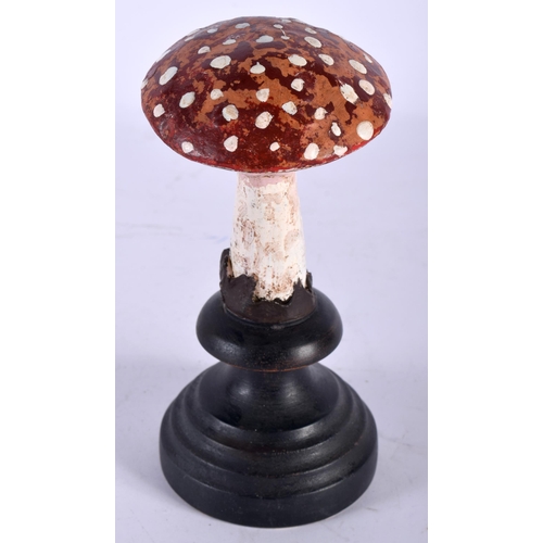 589 - A FOLK ART CARVED AND PAINTED WOOD MUSHROOM SPECIMEN. 21 cm high.