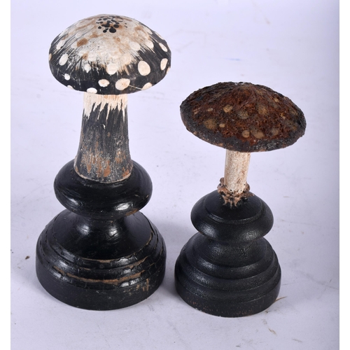 600 - TWO FOLK ART CARVED AND PAINTED WOOD MUSHROOM SPECIMENS. Largest 13 cm high. (2)