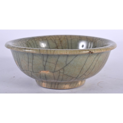 61 - A CHINESE QING DYNASTY GE TYPE STONEWARE BOWL of plain form. 12.5 cm diameter.