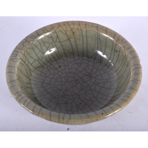 61 - A CHINESE QING DYNASTY GE TYPE STONEWARE BOWL of plain form. 12.5 cm diameter.