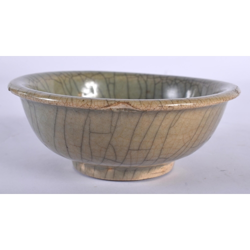 61 - A CHINESE QING DYNASTY GE TYPE STONEWARE BOWL of plain form. 12.5 cm diameter.