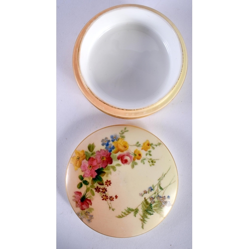 612 - A ROYAL WORCESTER BLUSH IVORY BOX AND COVER painted with flowers. 9.5 cm diameter.