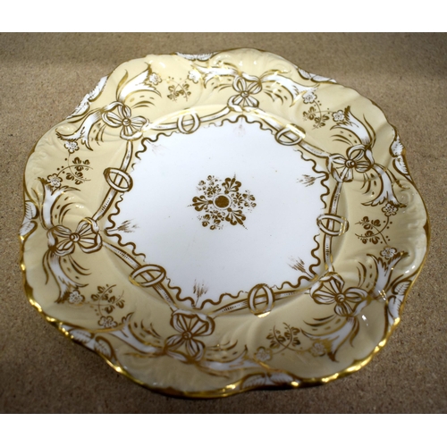 629 - AN EARLY 19TH CENTURY ENGLISH PORCELAIN CREAM AND GILT PORCELAIN TEASET. Largest 23 cm x 10 cm. (12)