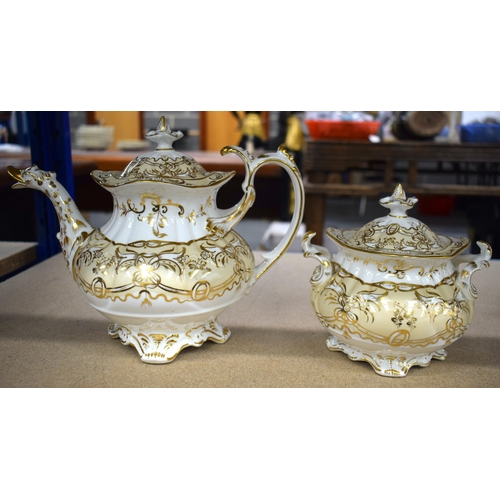 629 - AN EARLY 19TH CENTURY ENGLISH PORCELAIN CREAM AND GILT PORCELAIN TEASET. Largest 23 cm x 10 cm. (12)