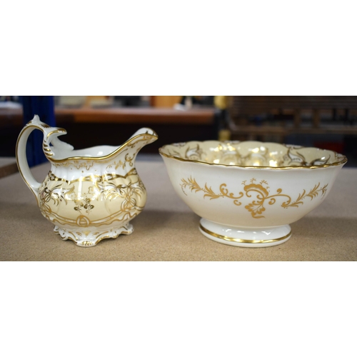 629 - AN EARLY 19TH CENTURY ENGLISH PORCELAIN CREAM AND GILT PORCELAIN TEASET. Largest 23 cm x 10 cm. (12)