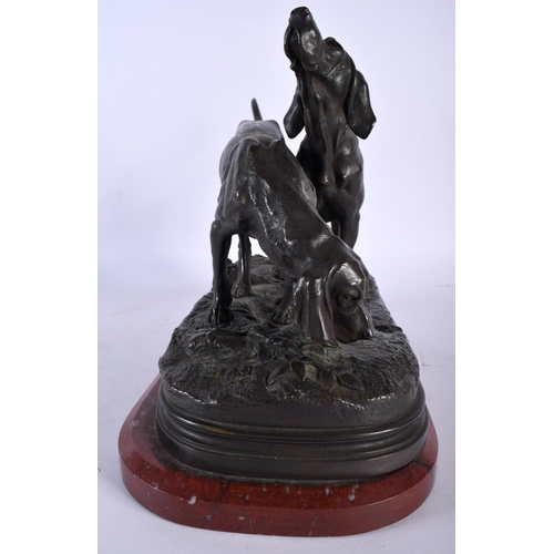 636 - AFTER ALFRED DUBUCAND (19th Century) A sculpture of two hunting dogs, signed A Dububand. 31 cm wide.