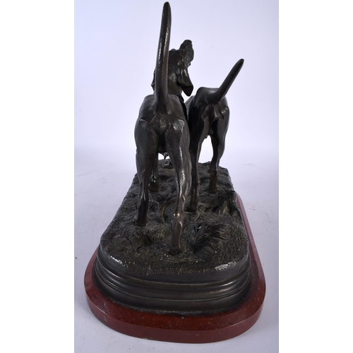 636 - AFTER ALFRED DUBUCAND (19th Century) A sculpture of two hunting dogs, signed A Dububand. 31 cm wide.