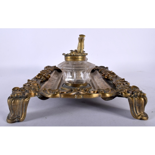 637 - AN EARLY 19TH CENTURY ENGLISH GILT BRONZE AND CUT GLASS DESK STAND the inkwells covered with hidden ... 