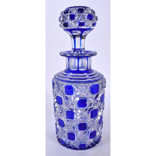 640 - A BACCARAT STYLE BLUE AND CLEAR FLASH GLASS DECANTER AND STOPPER together with a marble solitaire bo... 