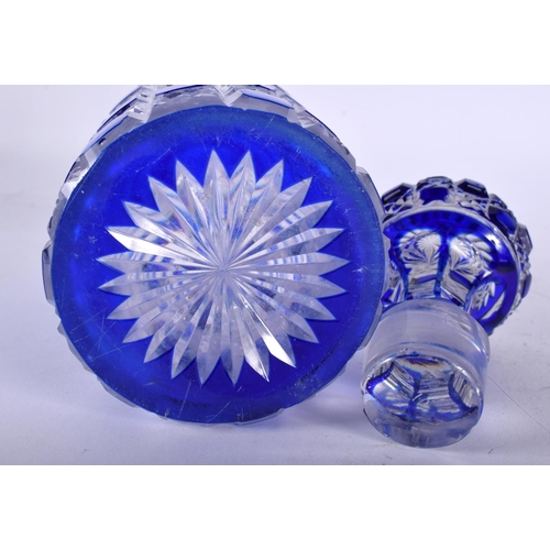 640 - A BACCARAT STYLE BLUE AND CLEAR FLASH GLASS DECANTER AND STOPPER together with a marble solitaire bo... 