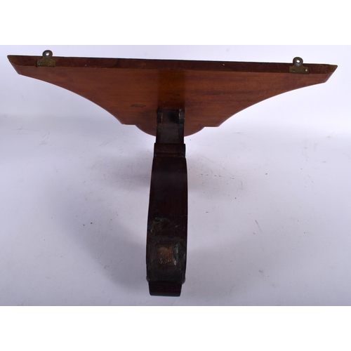 643 - A LARGE VICTORIAN MAHOGANY WALL BRACKET with scrolling supports. 50 cm x 30 cm x 42 cm.