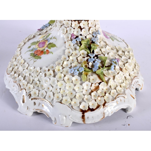 65 - A LARGE EARLY 20TH CENTURY GERMAN PORCELAIN ENCRUSTED COMPORT painted with flowers. 53 cm x 23 cm.