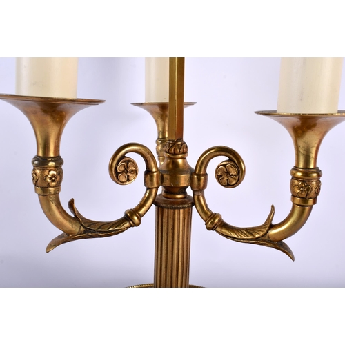 651 - A MID 19TH CENTURY FRENCH TRIPLE BRANCH ORMOLU CANDELABRA LAMP supported on a pierced base. 60 cm x ... 