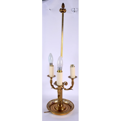 651 - A MID 19TH CENTURY FRENCH TRIPLE BRANCH ORMOLU CANDELABRA LAMP supported on a pierced base. 60 cm x ... 