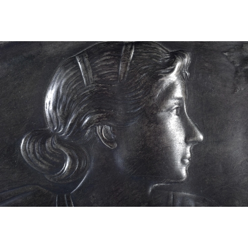 656 - A LARGE ART NOUVEAU WMF PEWTER TWIN HANDLED DISH decorative with a maiden. 38 cm x 24 cm.