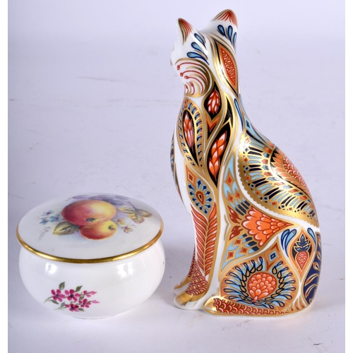 66 - A SMALL ROYAL WORCESTER PILL BOX by Banks, together with a Crown Derby imari cat paperweight. Larges... 