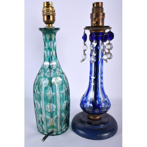 660 - TWO 19TH CENTURY COUNTRY HOUSE BOHEMIAN GLASS TABLE LAMPS. Largest 34 cm high. (2)