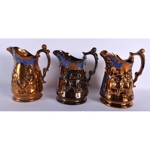 661 - A SET OF FIVE 19TH CENTURY GRADUATED LUSTRE JUGS decorative with figures. Largest 21 cm x 15 cm. (5)