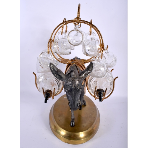 670 - A NOVELTY LATE VICTORIAN/EDWARDIAN SILVER PLATED DONKEY TANTALUS with glasses and twin barrels. Larg... 