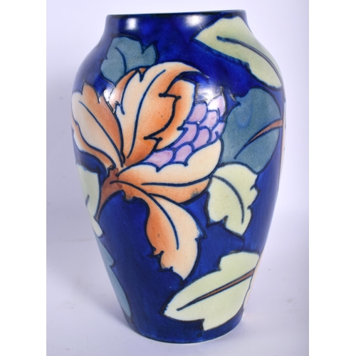 673 - AN ART DECO CHARLOTTE RHEAD BURLEIGH WARE VASE Pattern No 4002. 17 cm high.