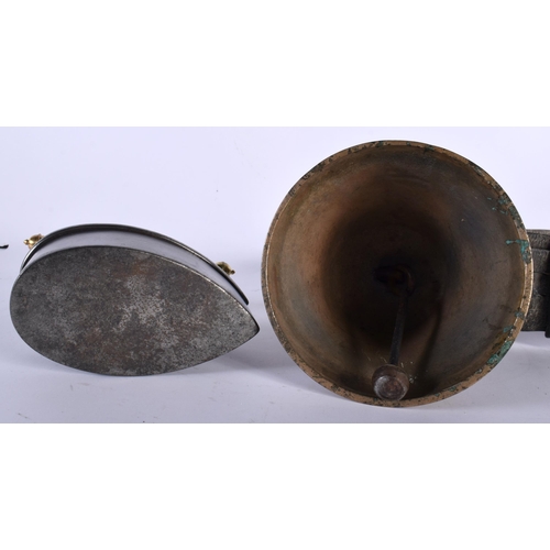 682 - AN ANTIQUE IRON together with an Indian bronze bell. Largest 28 cm wide. (2)