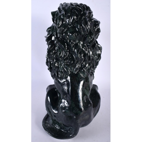 695 - A VERY LARGE ART DECO JADE PRESSED GLASS FIGURE OF A LION. 34 cm x 15 cm.