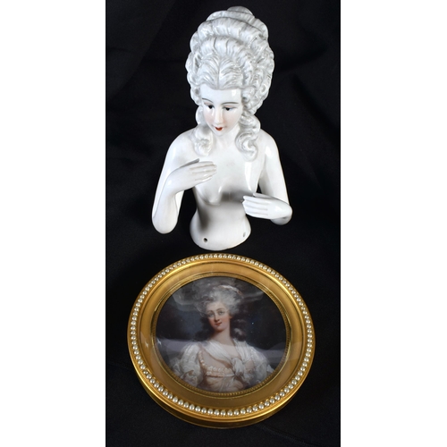 702 - AN ANTIQUE PEARL CASED WATERCOLOUR OF A FEMALE together with a porcelain half doll figure. Largest 1... 