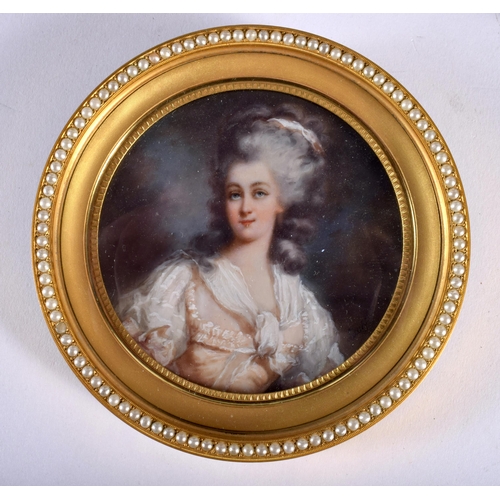 702 - AN ANTIQUE PEARL CASED WATERCOLOUR OF A FEMALE together with a porcelain half doll figure. Largest 1... 