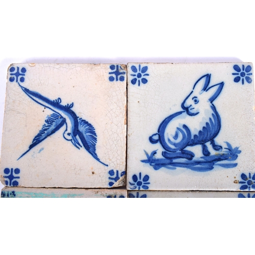 711 - FOUR 18TH CENTURY DELFT BLUE AND WHITE TILES. 13.5 cm square. (4)