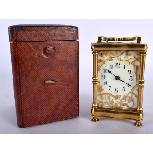 712 - A CASED ANTIQUE BRASS CARRIAGE CLOCK. 14.5 cm high inc handle.