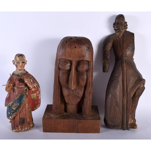 714 - TWO EARLY CONTINENTAL CARVED WOOD FIGURES together with a later wood bust of a female. Largest 36 cm... 