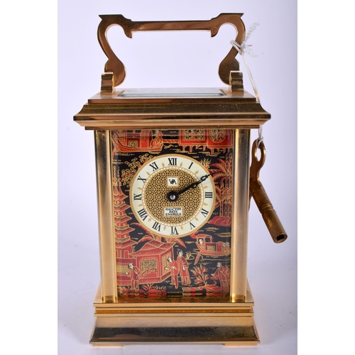 718 - A HALCYON DAYS BRASS CARRIAGE CLOCK. 15 cm high inc handle.