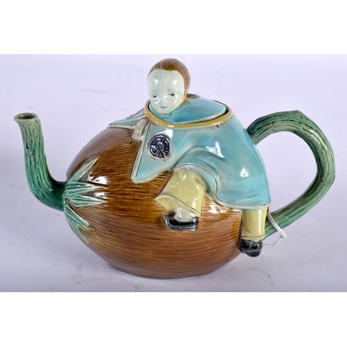72 - AN UNUSUAL 19TH CENTURY CONTINENTAL MAJOLICA TEAPOT AND COVER in the manner of Minton, formed as a E... 