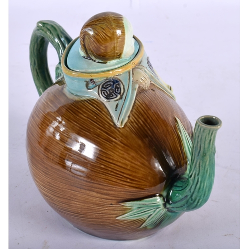 72 - AN UNUSUAL 19TH CENTURY CONTINENTAL MAJOLICA TEAPOT AND COVER in the manner of Minton, formed as a E... 