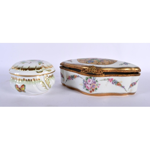 722 - A LARGE LIMOGES ENAMEL CASKET together with a herend porcelain box and cover. Largest 22 cm x 10 cm.... 