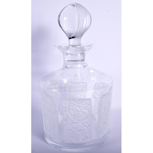 723 - A LARGE FRENCH LALIQUE GLASS DECANTER AND STOPPER together with two glasses. Largest 20 cm high. (3)