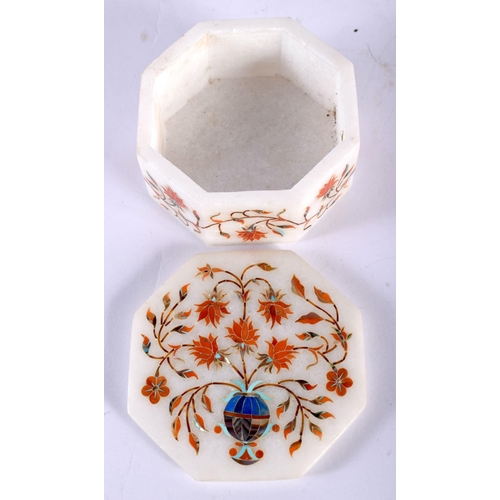 73 - A SMALL INDIAN HARDSTONE INLAID MARBLE BOX AND COVER. 8 cm wide.