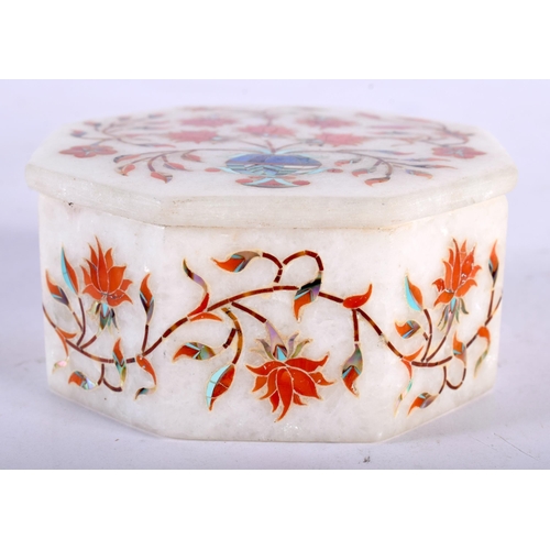 73 - A SMALL INDIAN HARDSTONE INLAID MARBLE BOX AND COVER. 8 cm wide.