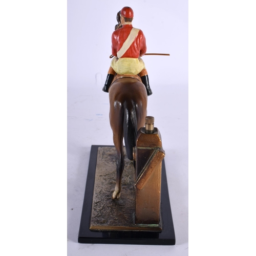 74 - AN EARLY 20TH CENTURY AUSTRIAN COLD PAINTED SPELTER EQUESTRIAN TABLE LIGHTER formed as a jockey. 18 ... 