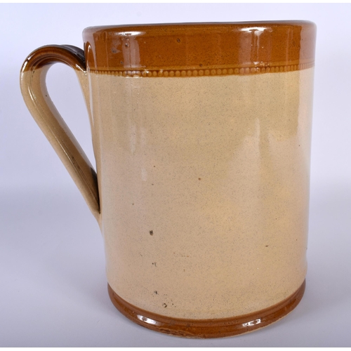 8 - A CHARMING NOVELTY COUNTRY POTTERY SALT GLAZED CHEDDAR FATHERS MUG. 23 cm x 20 cm.