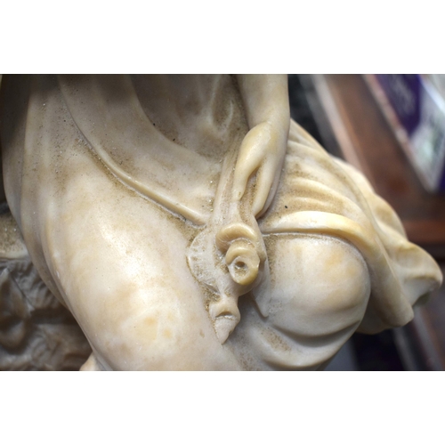 901 - A LARGE 19TH CENTURY CONTINENTAL ALABASTER LAMP formed as a seated female. 74 cm x 22 cm.