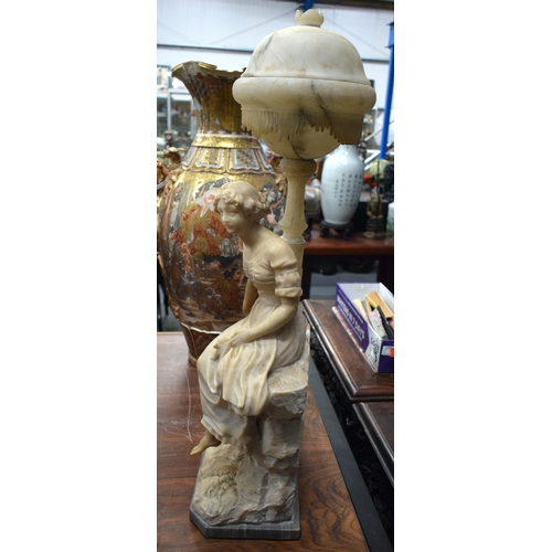 901 - A LARGE 19TH CENTURY CONTINENTAL ALABASTER LAMP formed as a seated female. 74 cm x 22 cm.