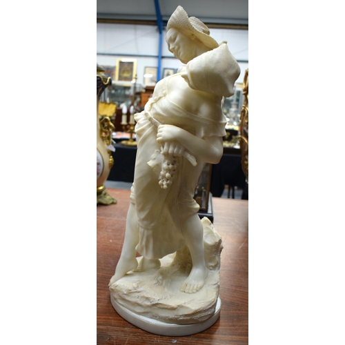 903 - A LARGE ANTIQUE CARVED MARBLE FIGURE OF LOVERS. 63 cm x 26 cm.