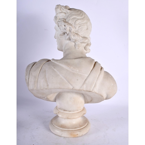 95 - AN 18TH/19TH CENTURY ITALIAN CARVED MARBLE BUST OF A MALE modelled in classical robes, After the Ant... 