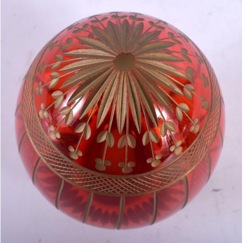 96 - A FABERGE GLASS EGG. 9.5 cm x 5 cm.